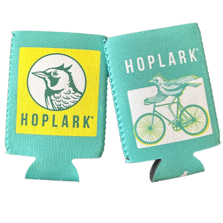 green koozies with printed designs. One has a bird and the other has a bicycle. Both feature the text 'HOPLARK'.