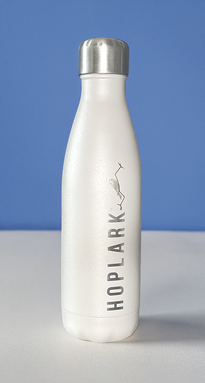 White water bottle with 'Hoplark' branding on a blue and gray background