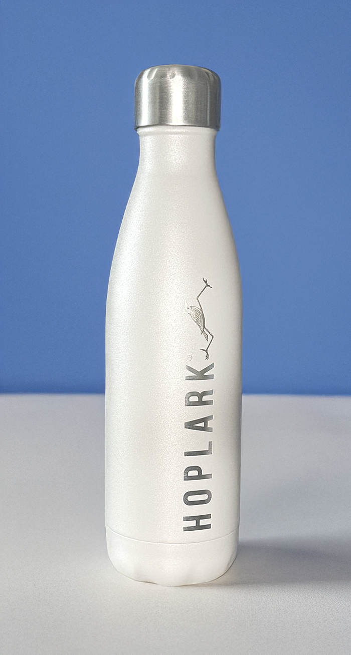 White water bottle with 'Hoplark' branding on a blue and gray background